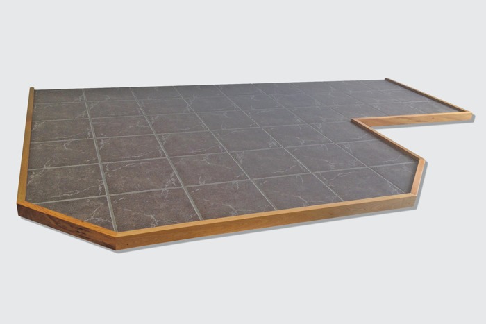 Custom tile, woodbasket hearth, rimu trim